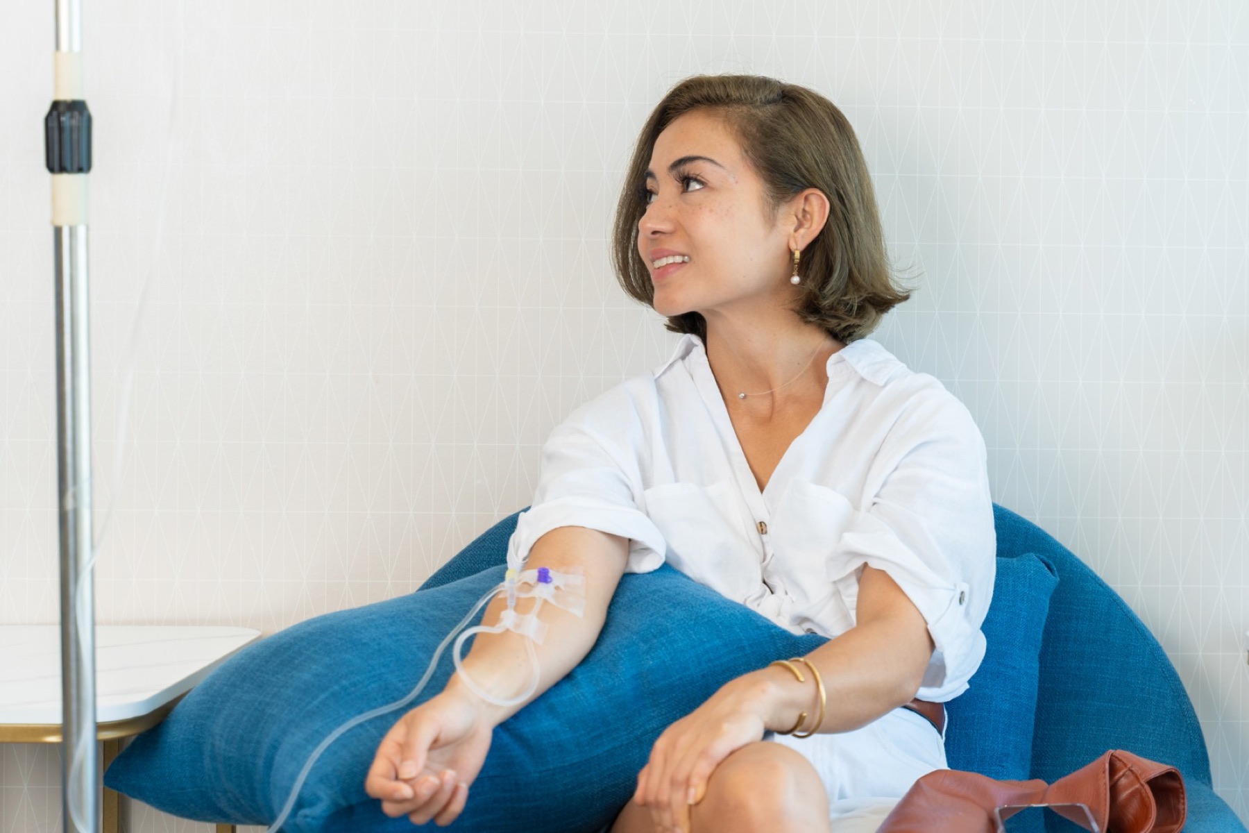 A patient receiving NAD+ IV therapy at Raya Preventive